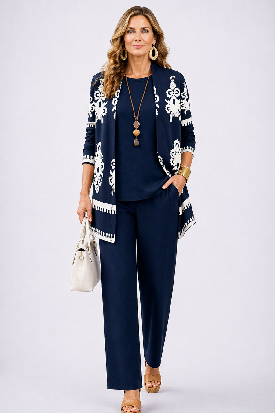 Navy blue 3-piece outfit set with patterned cardigan, top, and trousers