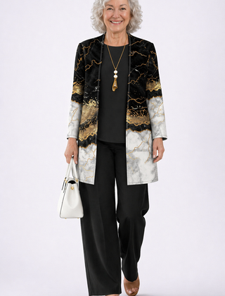 3-piece black jacket with gold marble print, black top and pants