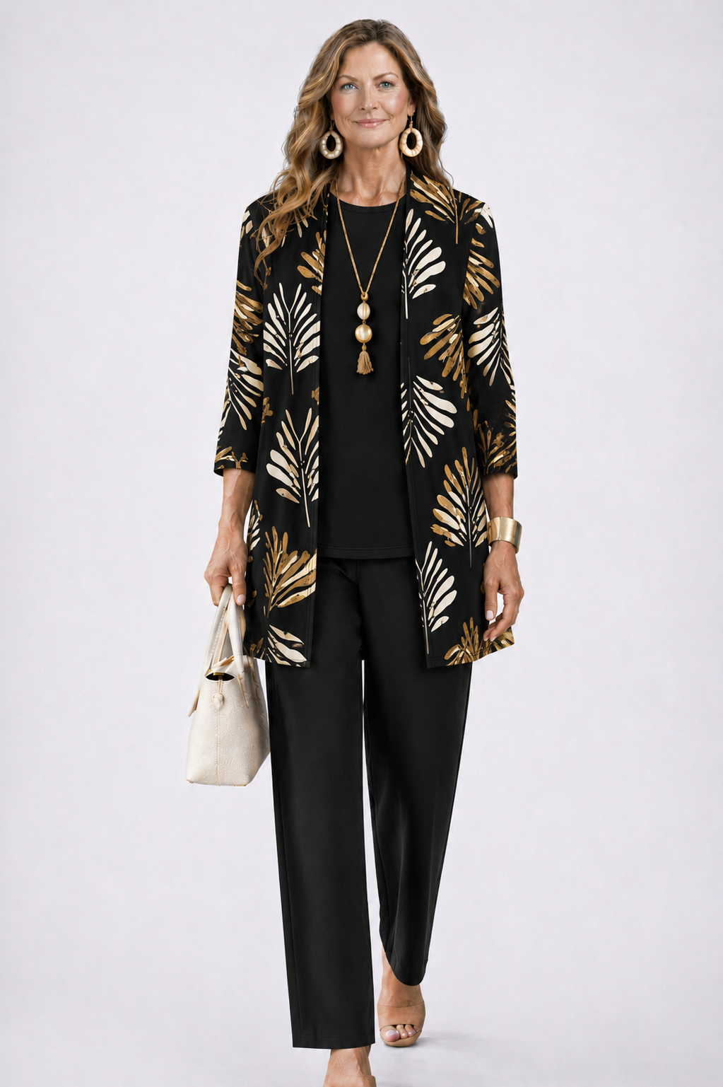 Black 3-piece set with open-front gold leaf print jacket and matching black slim pants