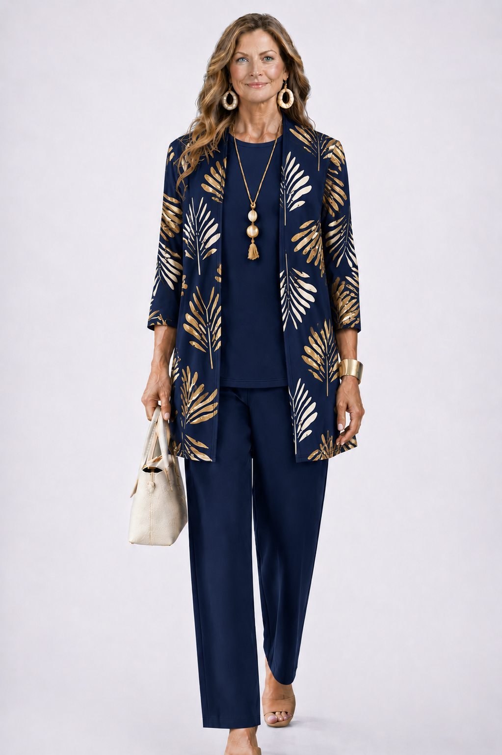 Navy 3-piece set with open-front gold leaf print jacket and matching slim pants