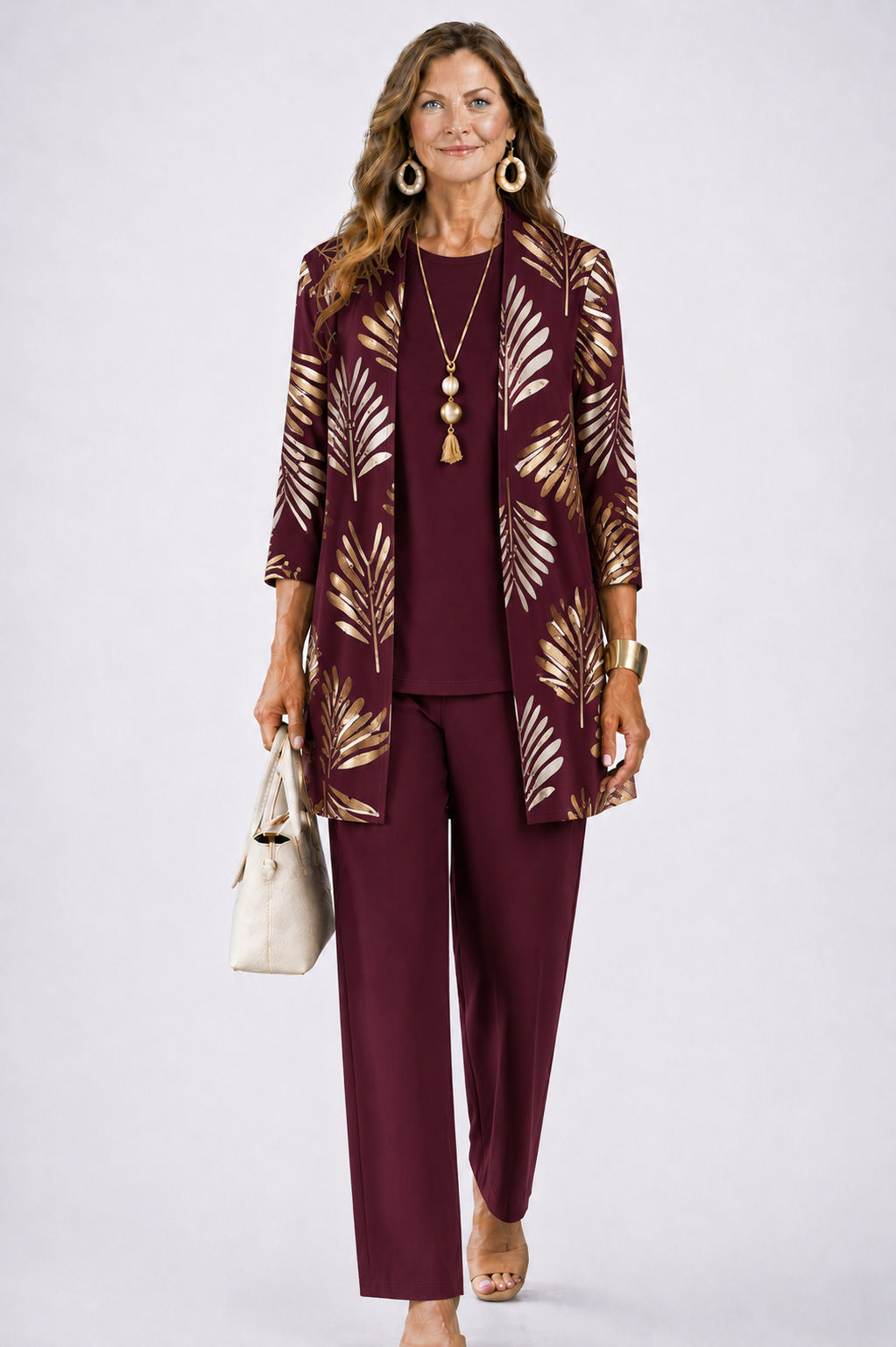 Burgundy 3-piece set with open-front gold leaf print jacket and matching slim pants