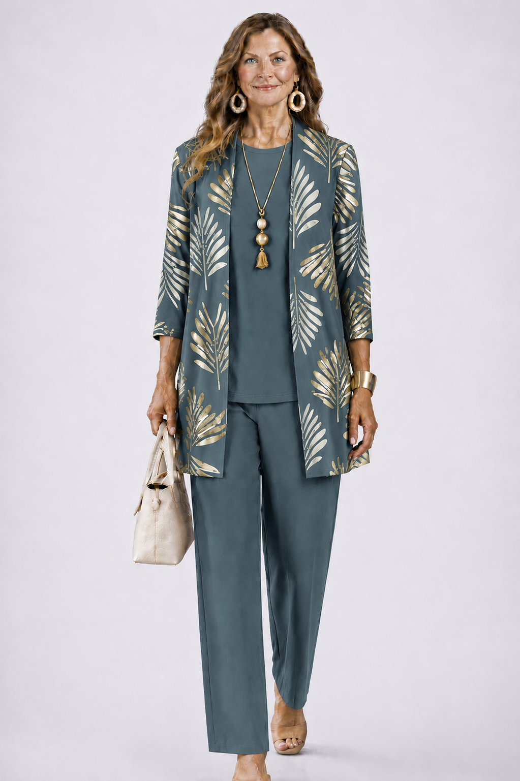 Blue-green 3-piece set with open-front leaf print jacket, teal top, and slim matching pants