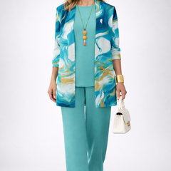 Women’s teal 3-piece set with blue abstract jacket and matching wide-leg trousers