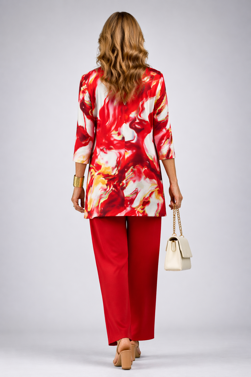 Red 3-piece pants set: back view of printed jacket with gold cuffs and red trousers
