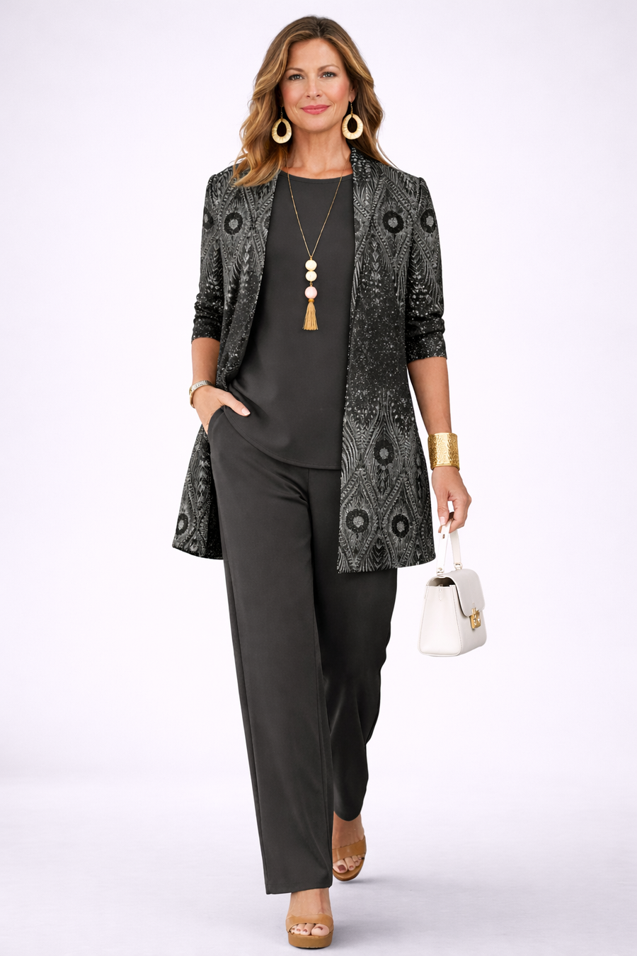 Women's black 3-piece set with patterned 3/4-sleeve jacket, draped top, and pants