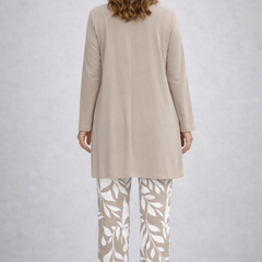 Beige long-sleeve tunic and leaf-print pants, back view