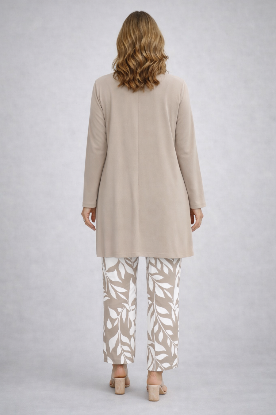 Beige long-sleeve tunic and leaf-print pants, back view
