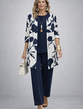 Navy blue 3-piece set with botanical print cardigan, matching top, and cropped trousers