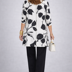 Etheline 3-piece set: back view of black-and-white floral open jacket over black trousers