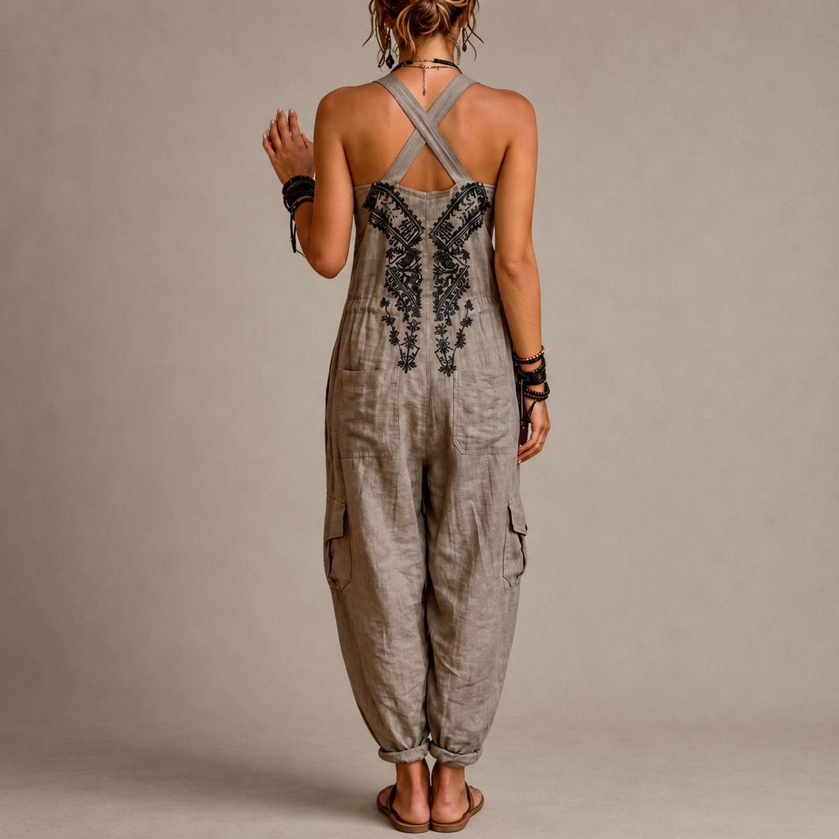 Boho harem overalls back view with cross-back straps and embroidered chest panel