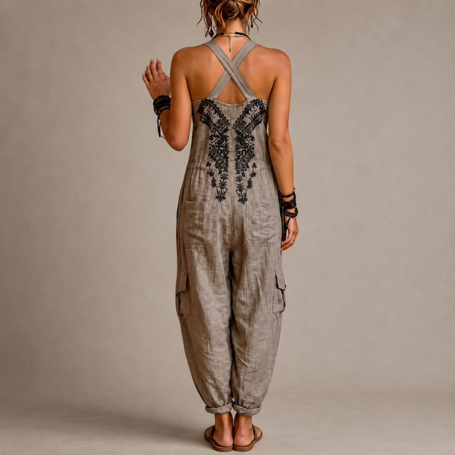 Boho harem overalls back view with cross-back straps and embroidered chest panel