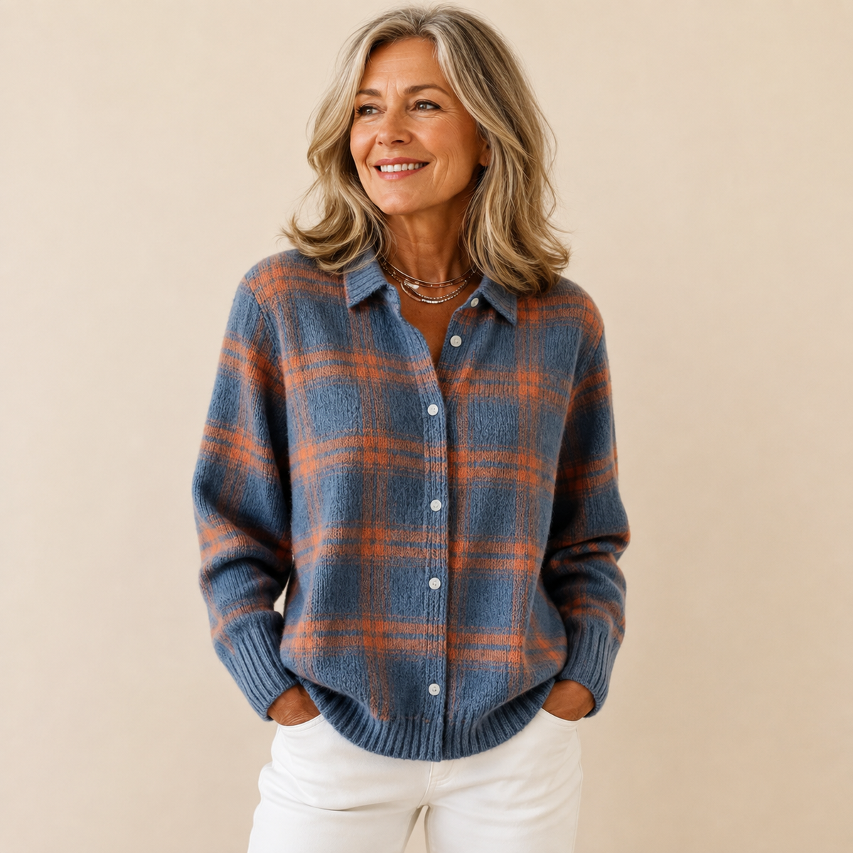 Blue plaid button-up cardigan with front buttons and long sleeves