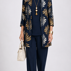 Women’s 3-piece set with navy top and pants, plus gold-and-ivory leaf open jacket.