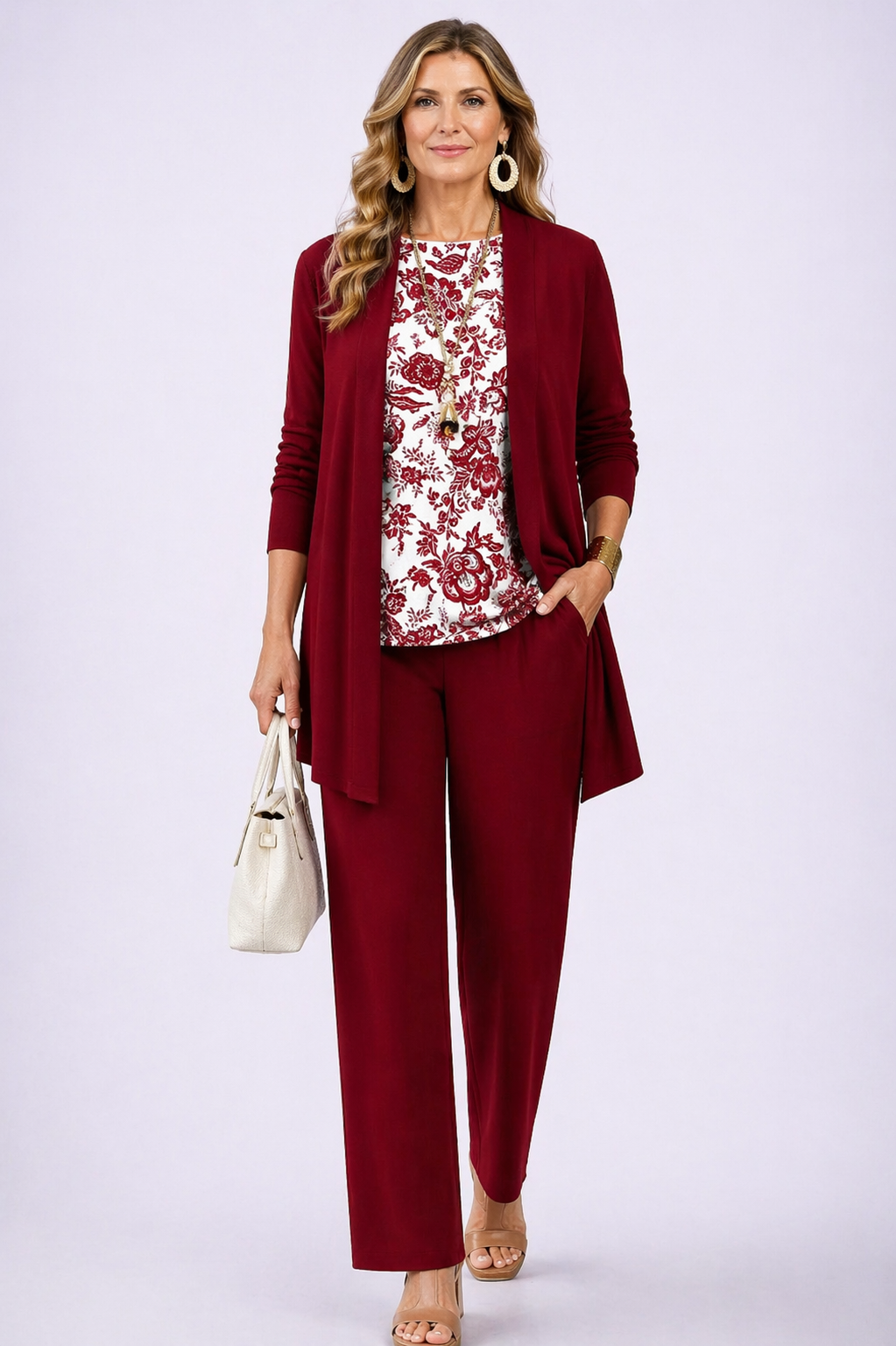 3-piece womens set: burgundy cardigan over floral white and red blouse with matching pants
