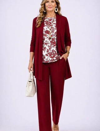 Burgundy 3-piece set with long buttonless jacket, patterned top, and slim pants