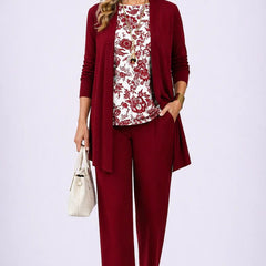 Burgundy 3-piece outfit with long cardigan, white floral blouse, and matching trousers