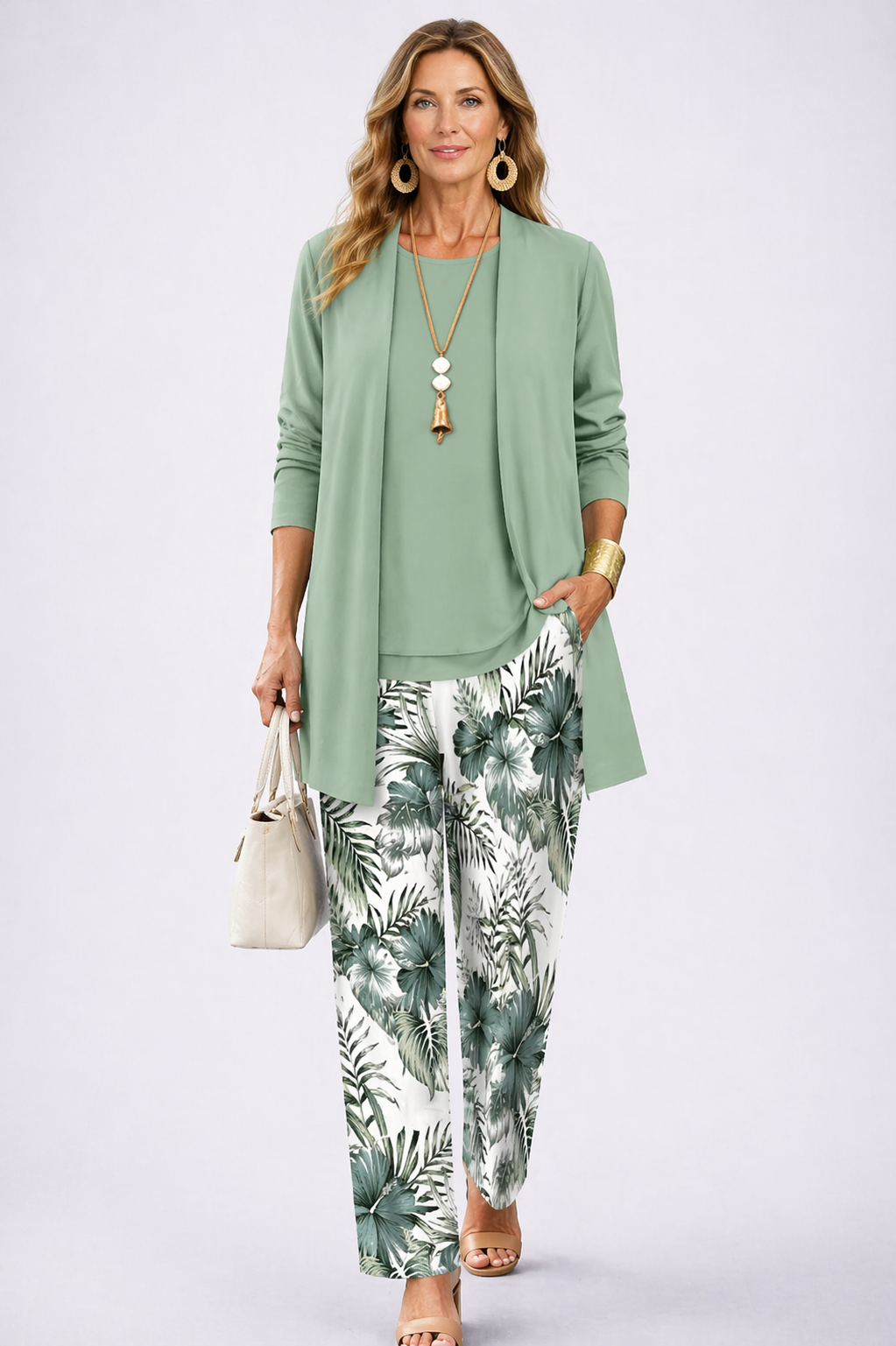 Three-piece set: sage green cardigan, green top, and white leaf-print pants