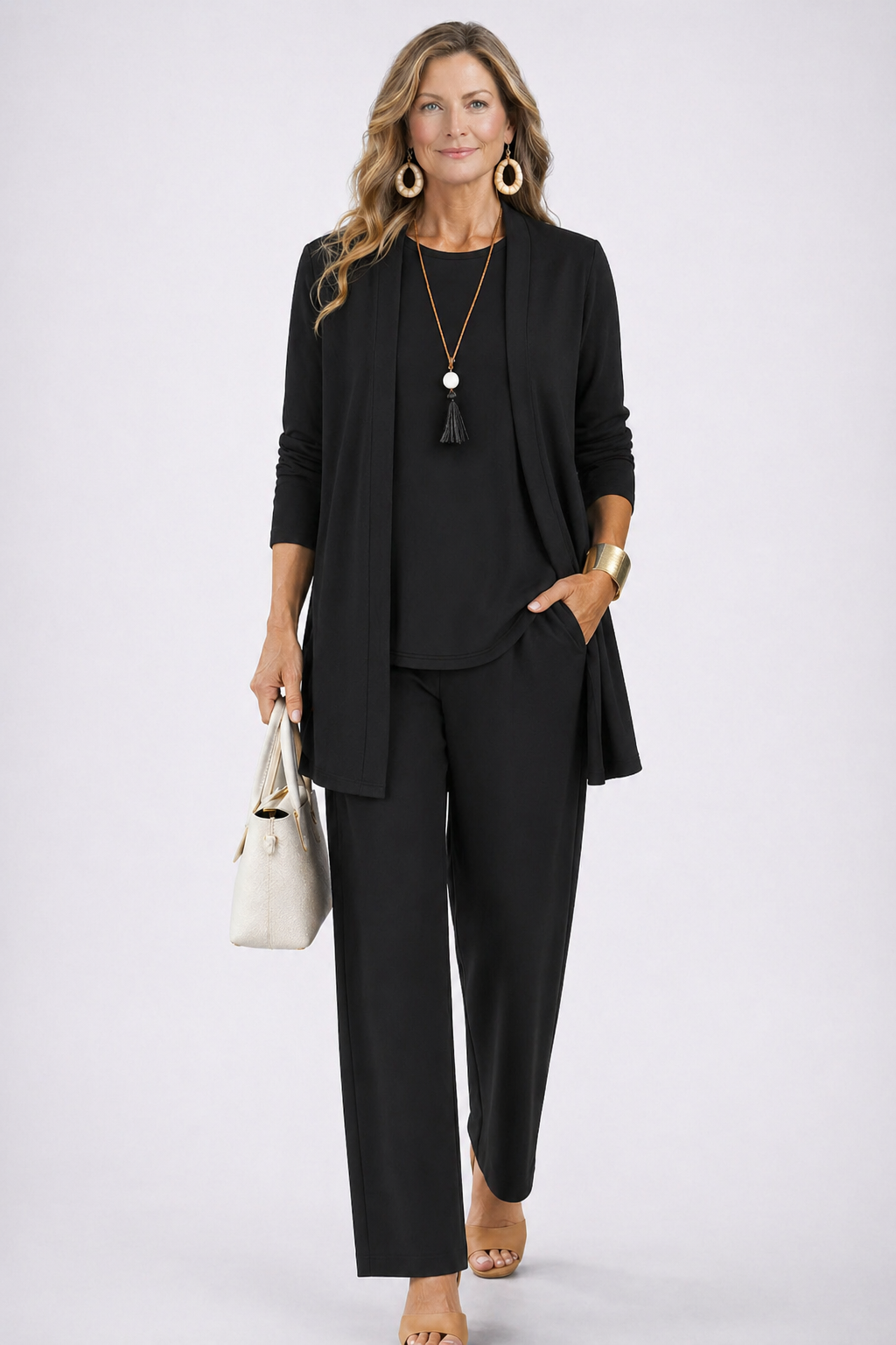 Black elegant 3-piece set with open cardigan, shell top, and straight-leg trousers.