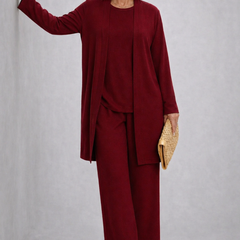 Burgundy elegant 3-piece set with long cardigan, layered top, and wide-leg pants.