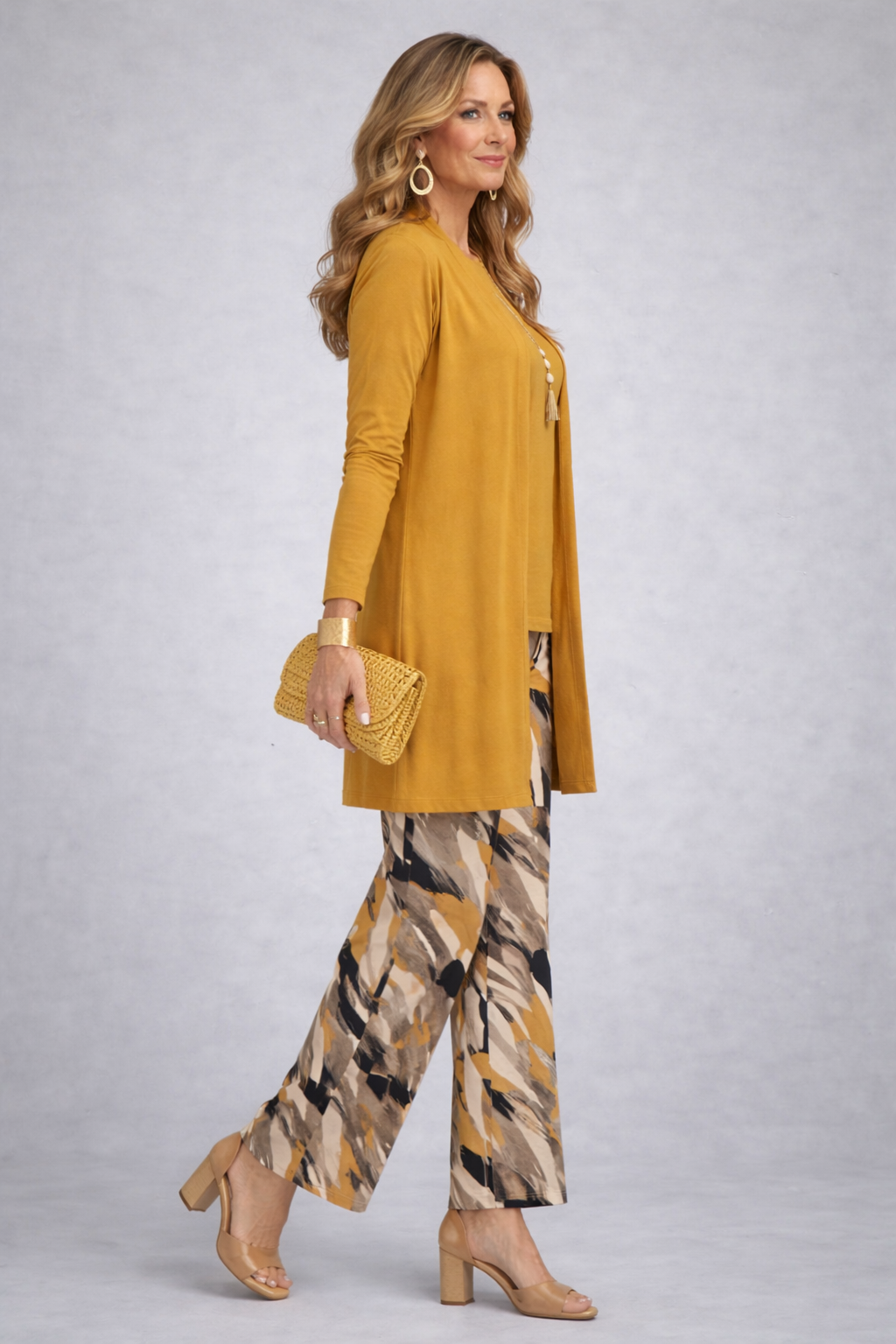 Women's yellow long cardigan and abstract-print trousers 3-piece set, side view