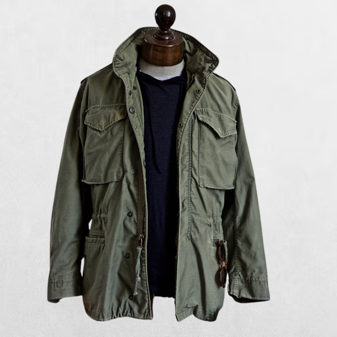 Green heritage utility jacket with hood, snap front, and flap chest pockets