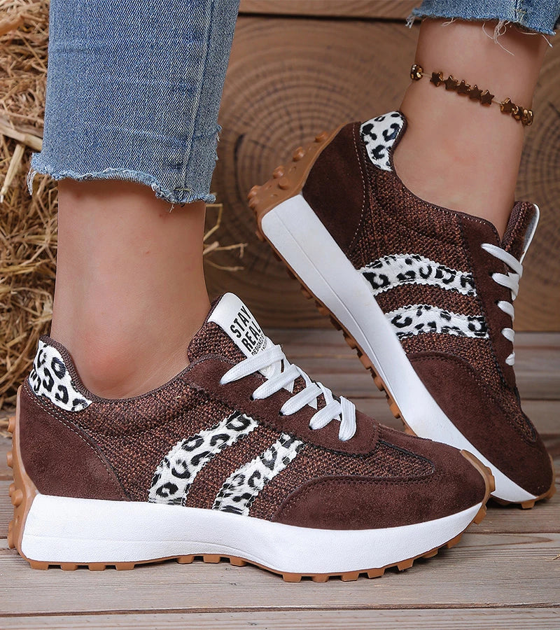 Brown everyday comfort trainers with leopard-print panels, white laces, and white sole