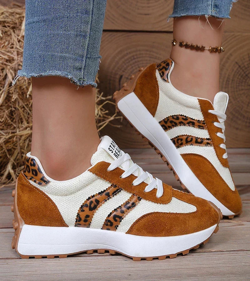 Everyday comfort trainers with white rubber sole, brown suede panels, leopard print.