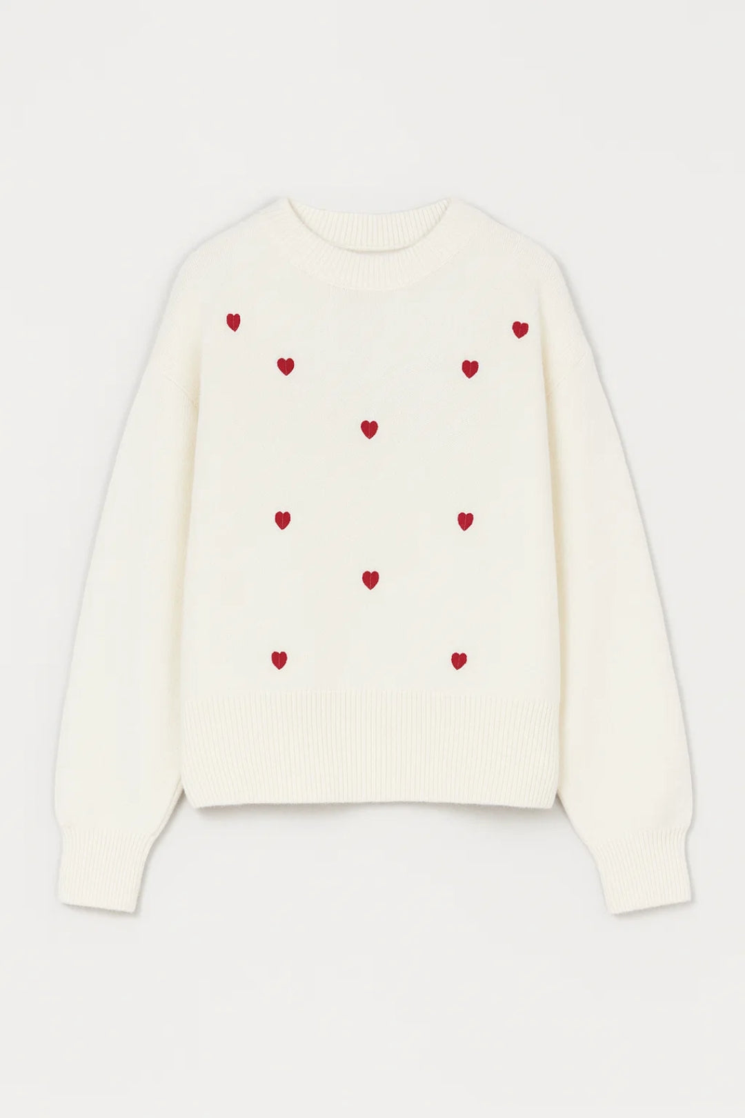 Romilly white jumper front, scattered red hearts pattern, ribbed crew neck