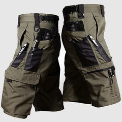 Olive green outdoor tactical shorts with large cargo pockets and side utility pouches