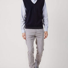 Light grey slim trousers with button closure, belt loops, and tapered fit