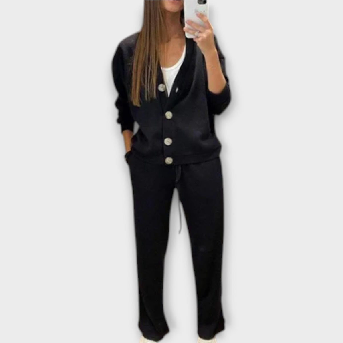 Black cardigan and drawstring trouser set, button front, long sleeves.