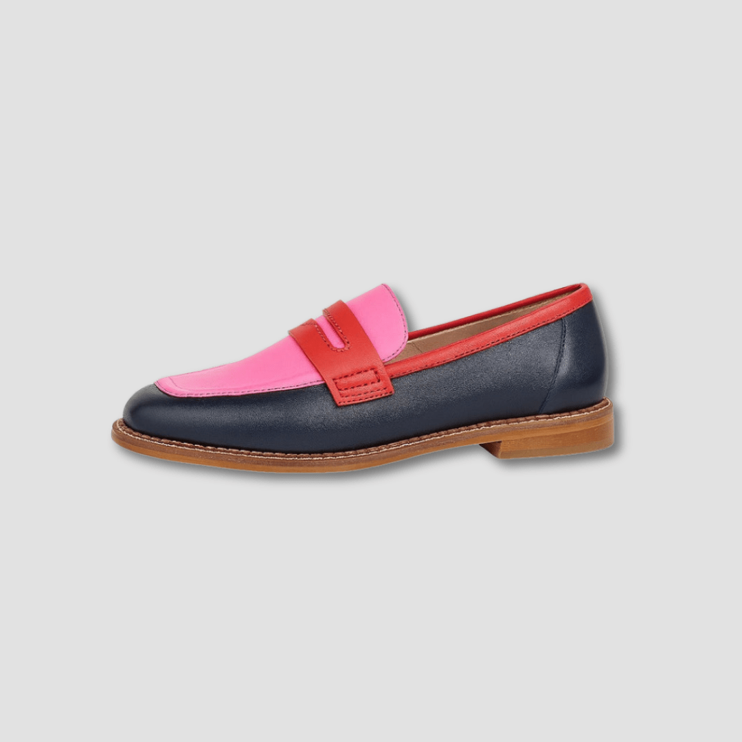 Navy loafers with pink tongue and red trim, flat leather-look sole
