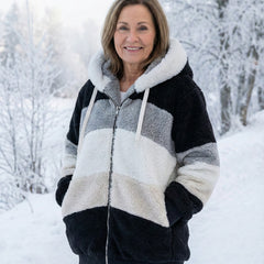 Plush colorblock jacket in black, gray, and cream with zip front and hood