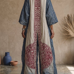 Printed two-piece set back view: indigo top with vertical cream panel and burgundy print