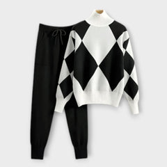 Black sweater-and-jogger set with white diamond argyle knit pullover and cuffed pants