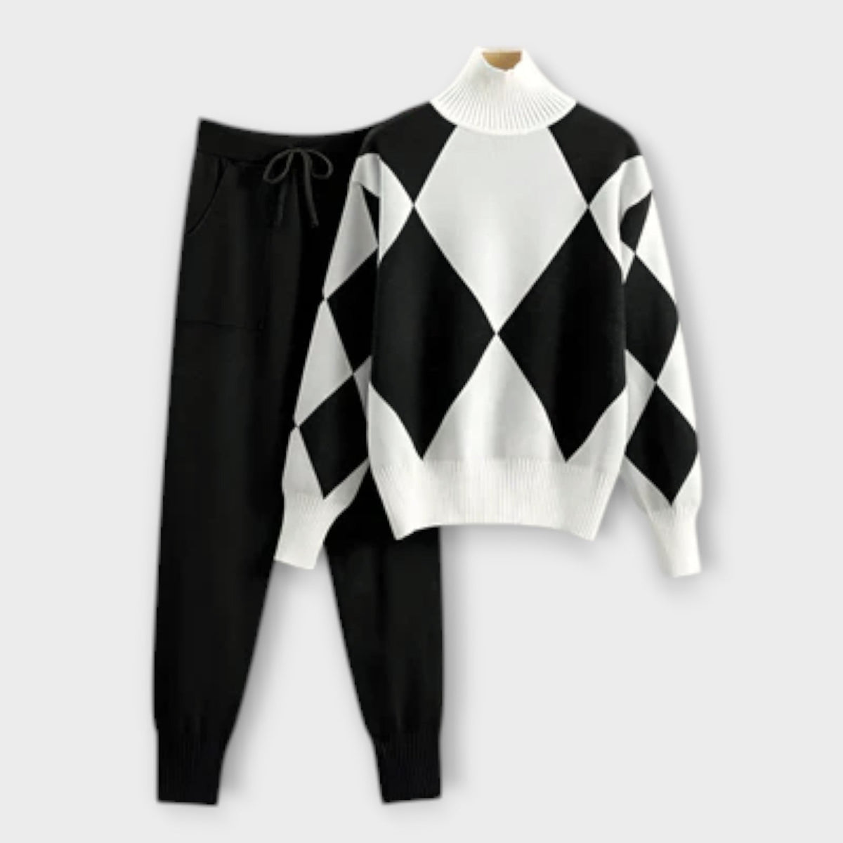 Black sweater-and-jogger set with white diamond argyle knit pullover and cuffed pants