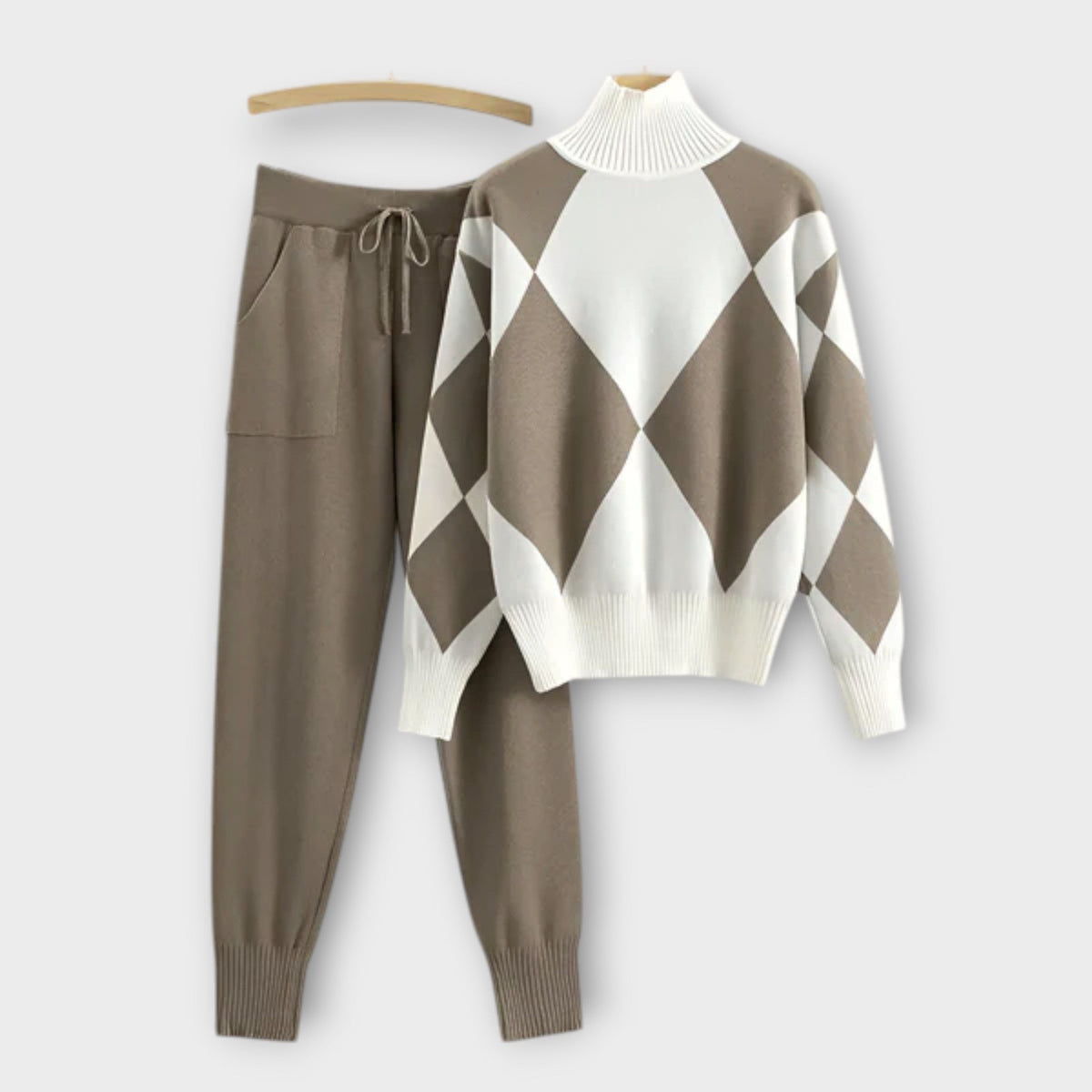 Beige sweater-and-jogger set with white diamond argyle knit pullover and cuffed pants