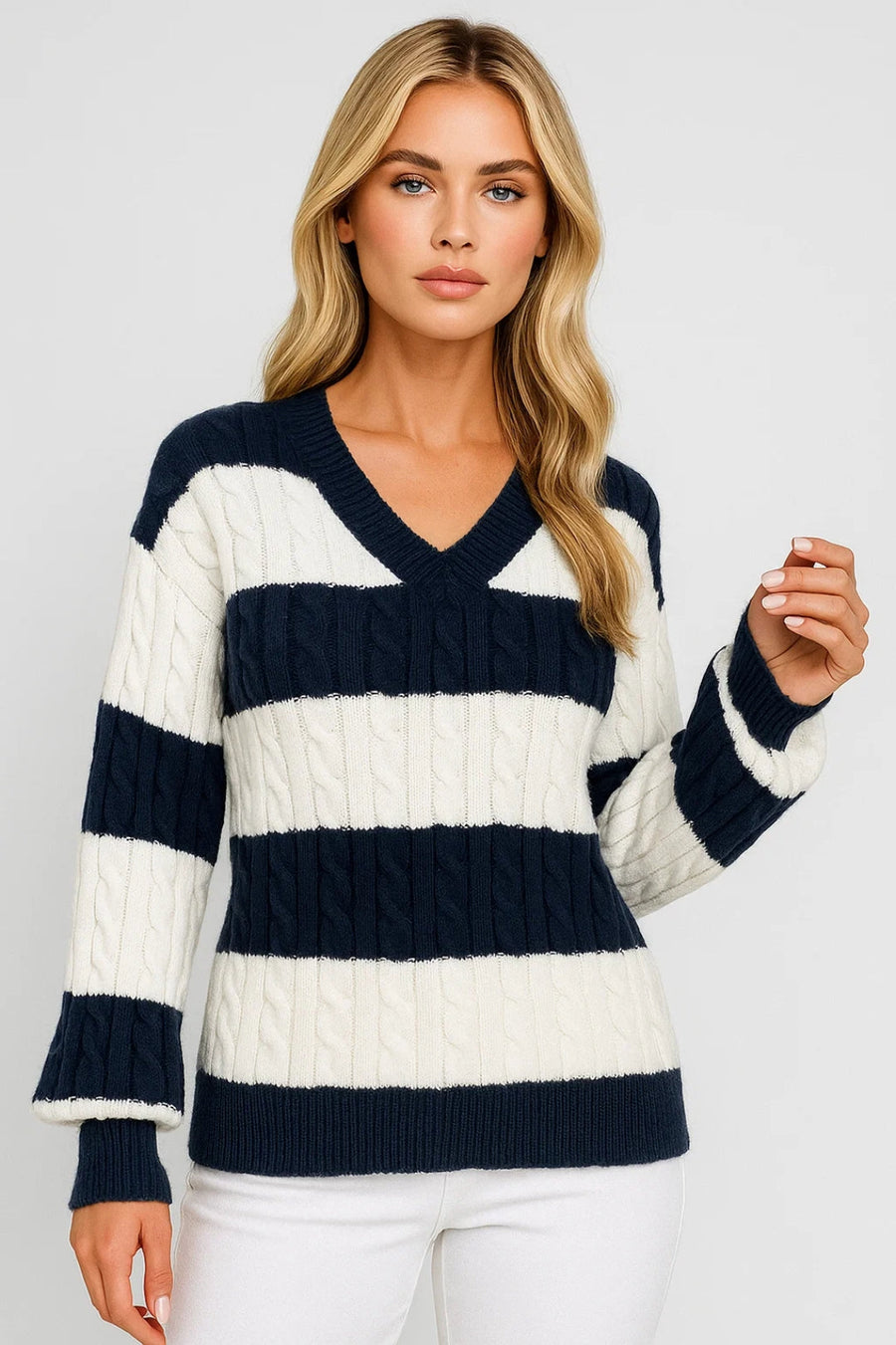Dark blue and white V-neck cable knit striped jumper, front view