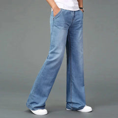Medium light blue flare boot cut jeans with side seam stitching and wide bell leg