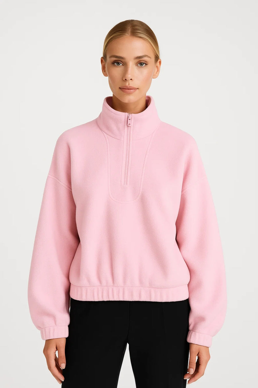 Light pink half-zip knit sweater with stand collar and ribbed cuffs