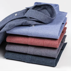 Folded KINGSMERE patterned shirts stack in blue, red, and grey, button-down collars