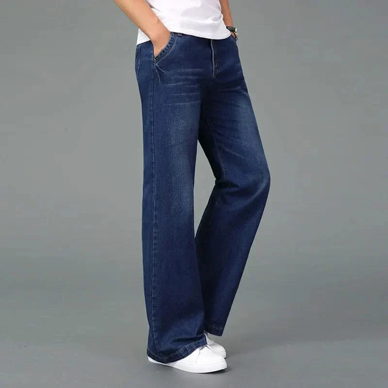 Navy blue flare boot cut jeans with front pockets and tapered-to-flare leg