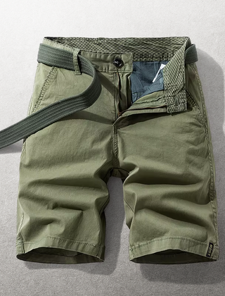 Green cotton shorts with belt loops, front button closure, and side pockets