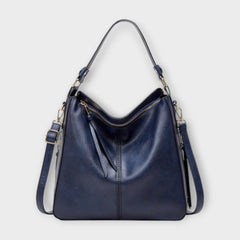 Large hobo bag in navy blue leather-look with front center seam and zipper pocket