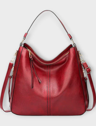 Large hobo bag in red leather-look with front center seam and zipped top pocket