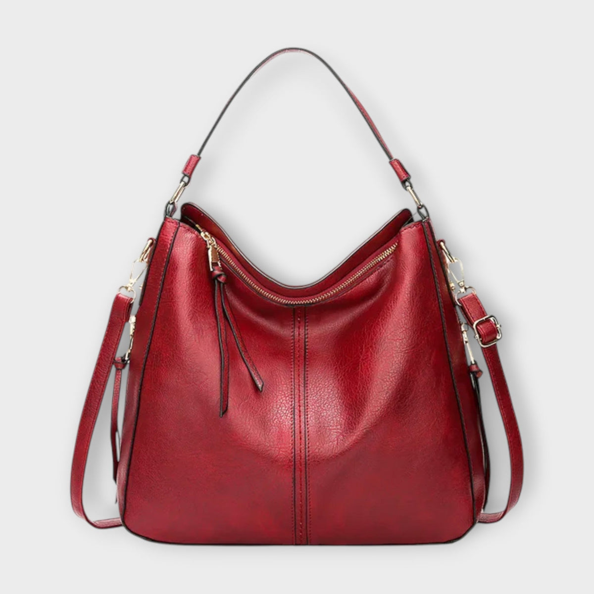 Large hobo bag in red leather-look with front center seam and zipped top pocket