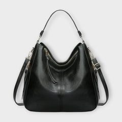 Large hobo bag in black leather-look with front center seam and U-shaped zip pocket