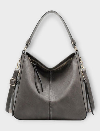 Large hobo bag in gray leather-look with front center seam and hanging side tassels