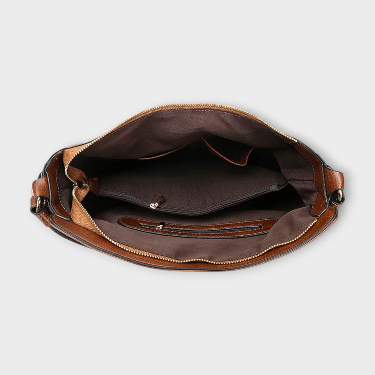 Large hobo bag interior view with open top, brown lining, and zip pocket