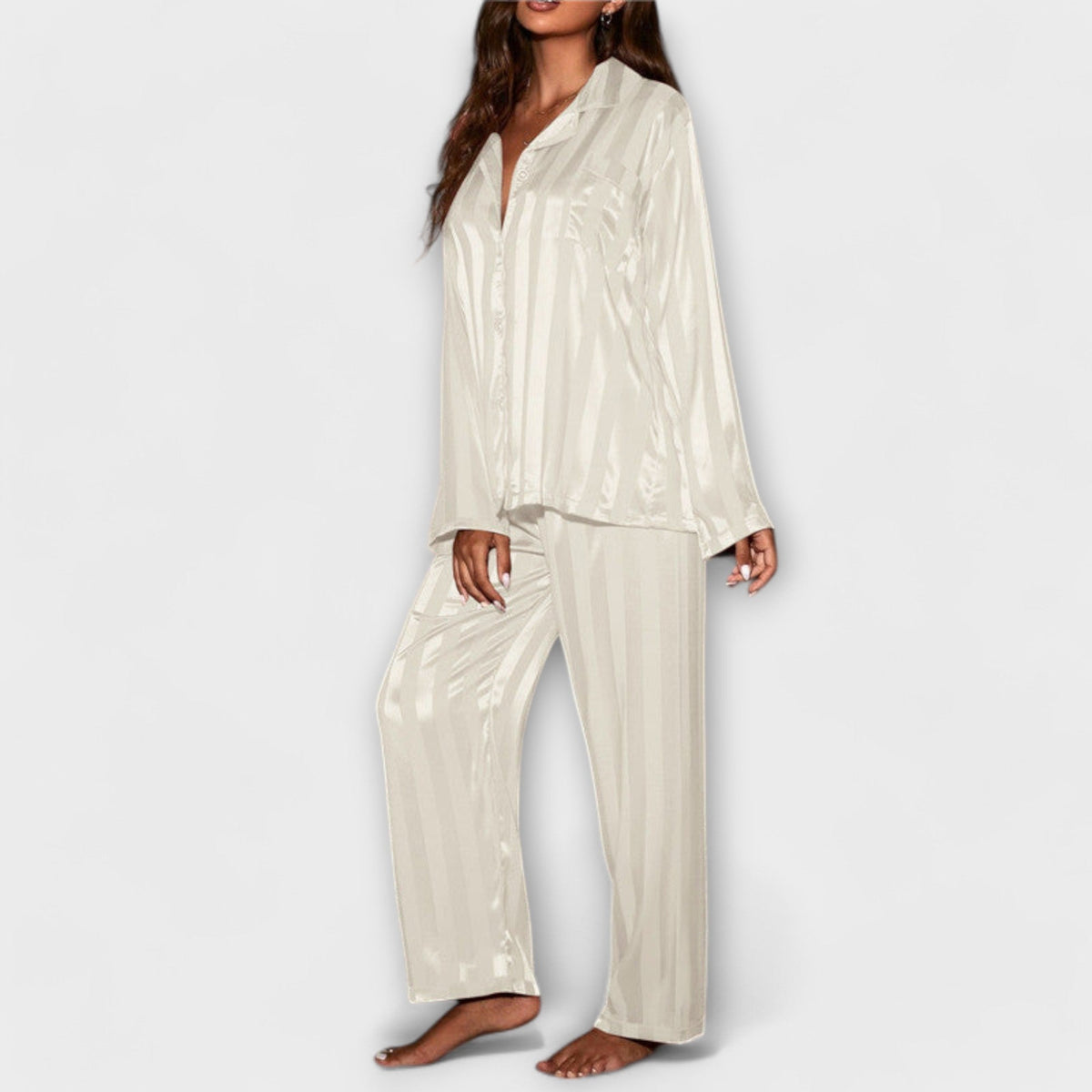 White casual set with button-front long-sleeve shirt and wide-leg striped trousers